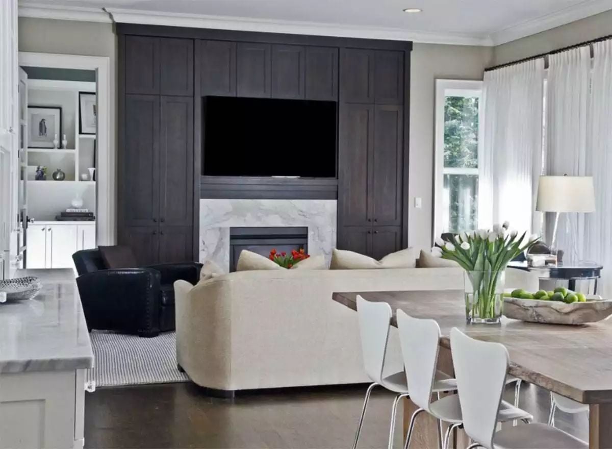 Dark Cabinetry Wall Does the Heavy Lifting So Nothing Else Has To