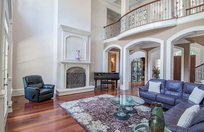 Double-Height Ceilings and a Baby Grand Signal What Kind of House This Really Is