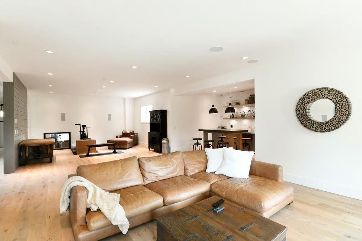Leather Sectional and a Wet Bar Alcove That Make a Basement Feel Like a Destination