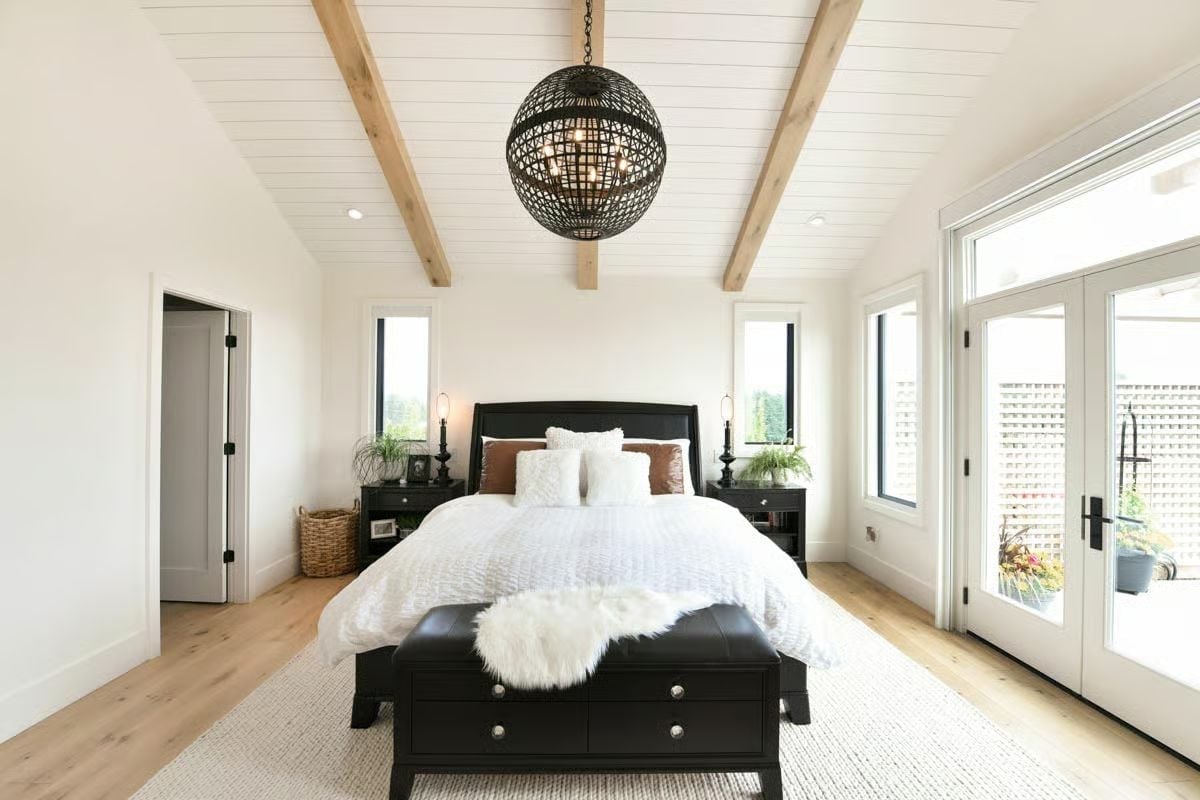 Orb Chandelier and Shiplap Ceiling That Make Vaulted Space Feel Intentional