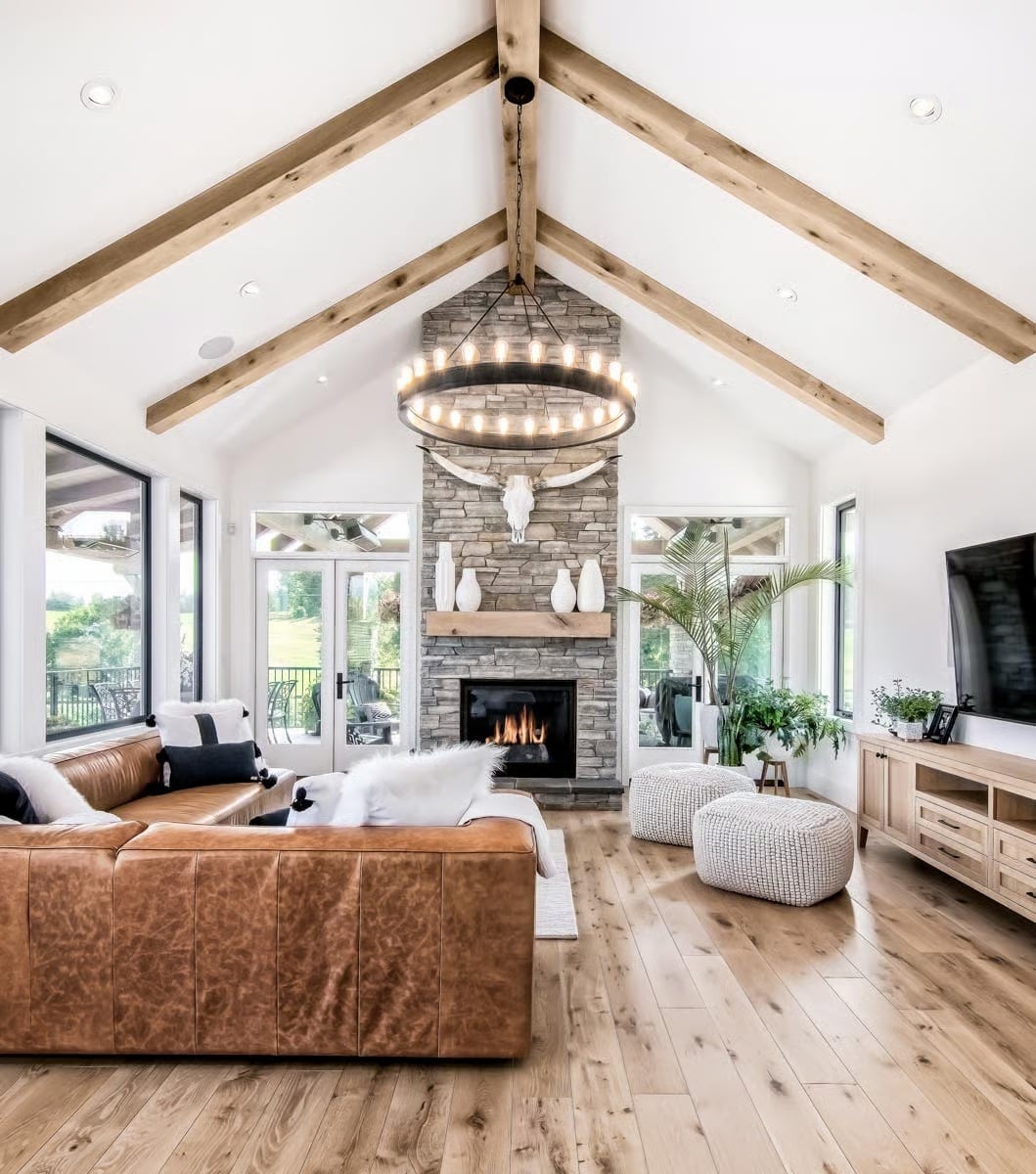 Vaulted Beams and a Stone Fireplace That Actually Earn the Room's Scale