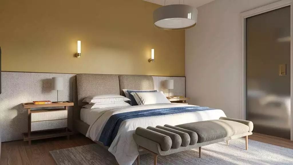 Gold Sconces, Upholstered Headboard, and a Bench That Actually Earns Its Spot