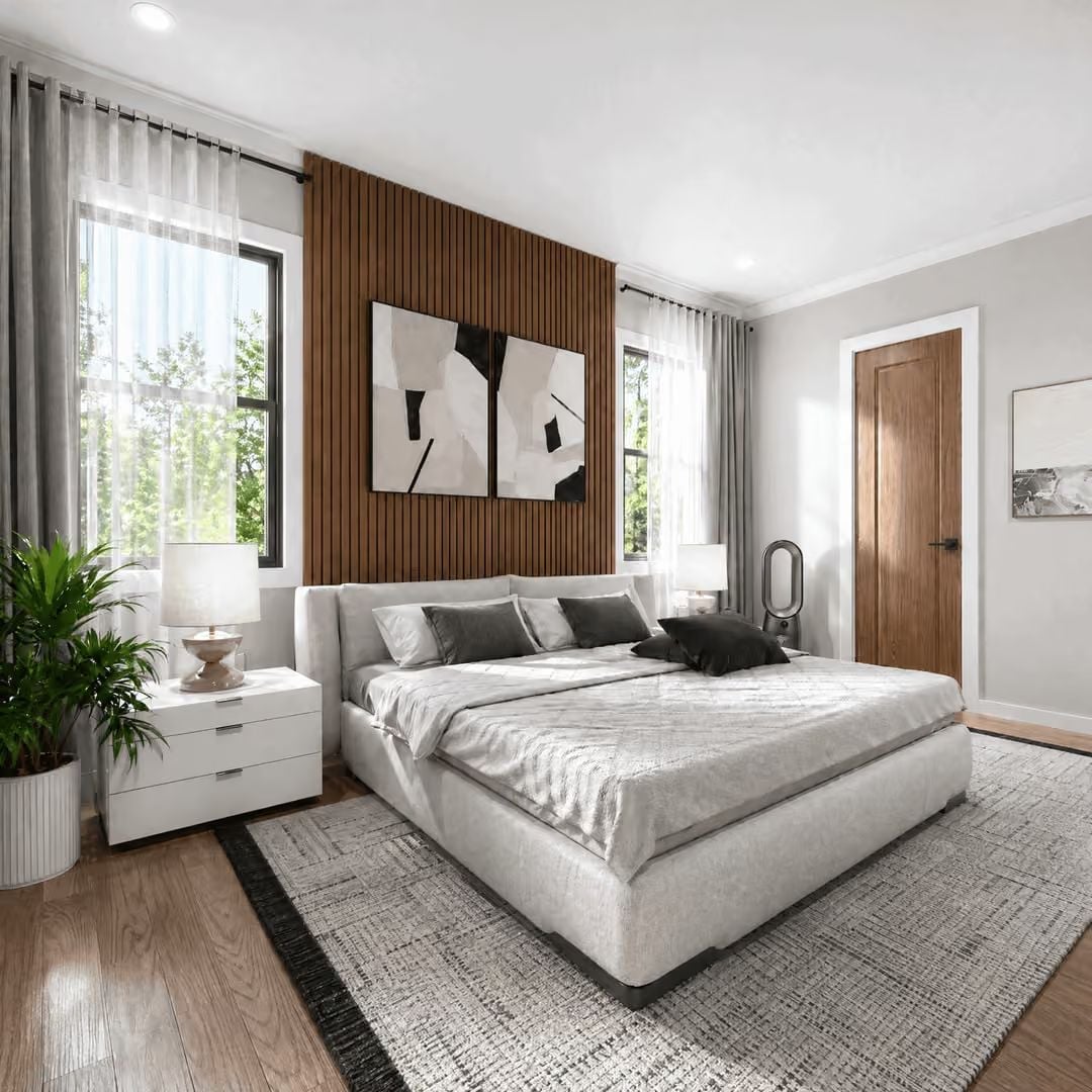 Vertical Wood Slat Panel Turns the Bed Wall Into the Room's Quiet Focal Point