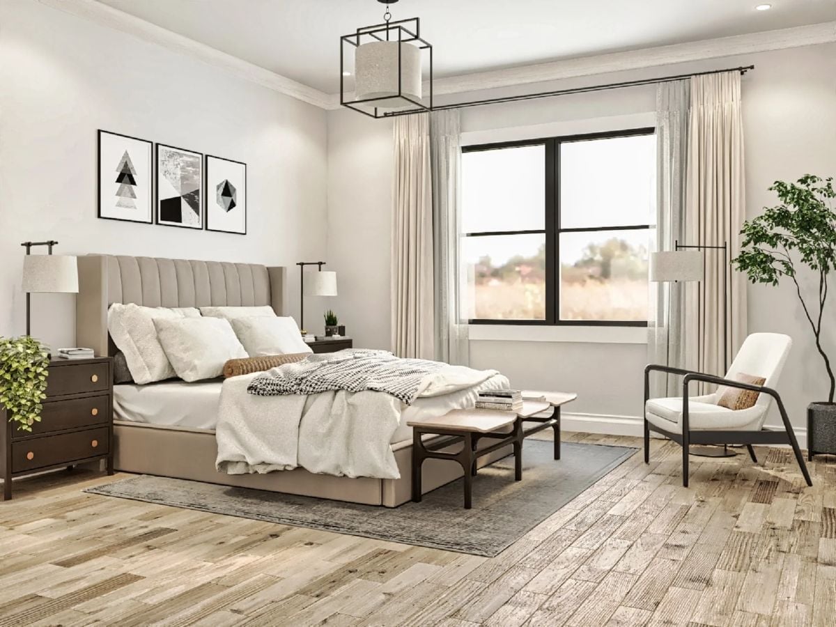 Channeled Headboard, Warm Wood Floors, and a Reading Chair That Actually Fits the Room