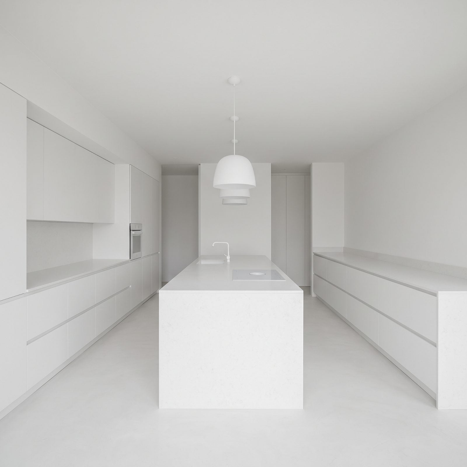 White Cabinets Disappearing Into an All-White Room