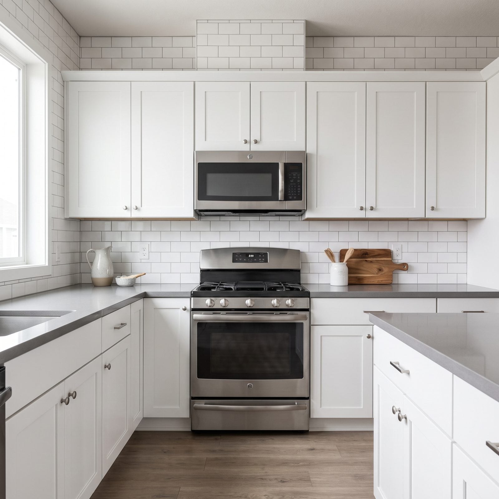 White Shaker Cabinets With Generic Subway Tile Everywhere