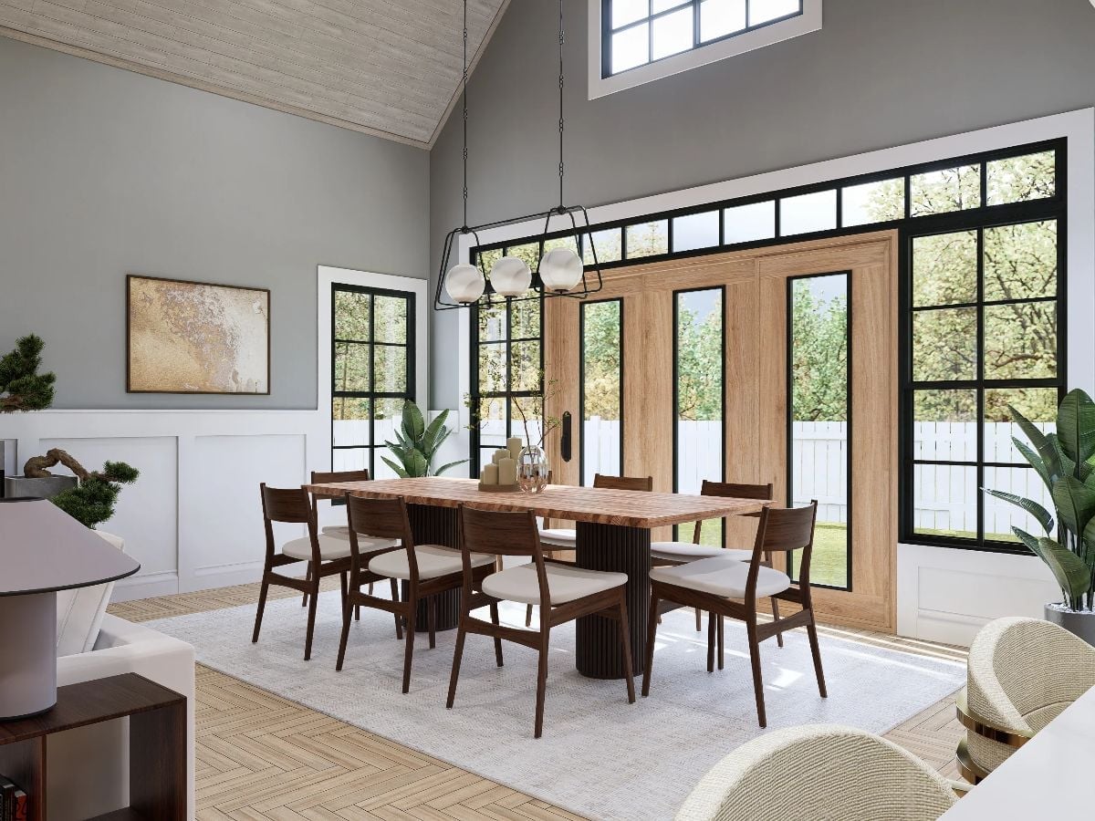 Fluted Pedestal Base, French Doors, and a Chandelier That Doesn't Apologize