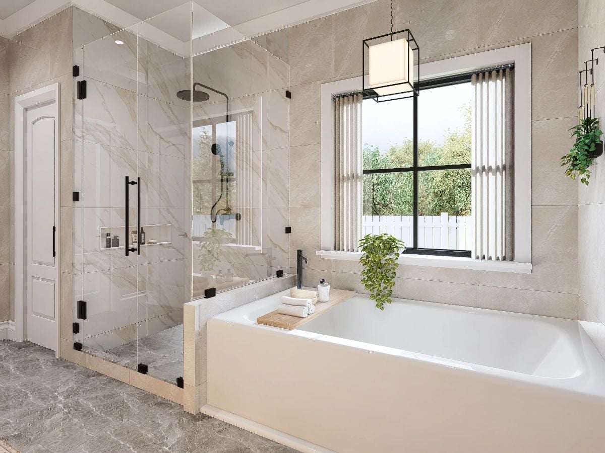 Marble Walls, a Freestanding Tub, and Glass That Earns Every Square Foot