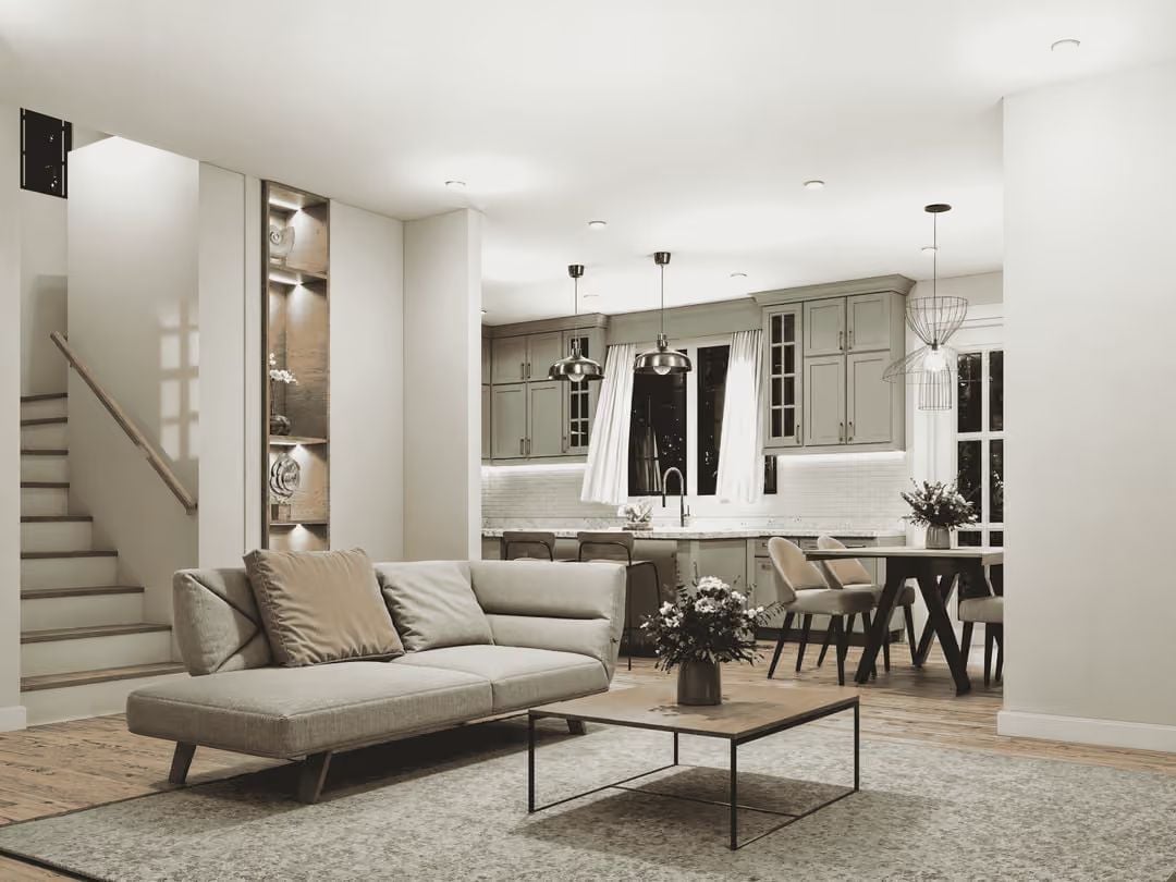 Sage Cabinets, Warm Wood Floors, and a Kitchen Island Worth Gathering Around