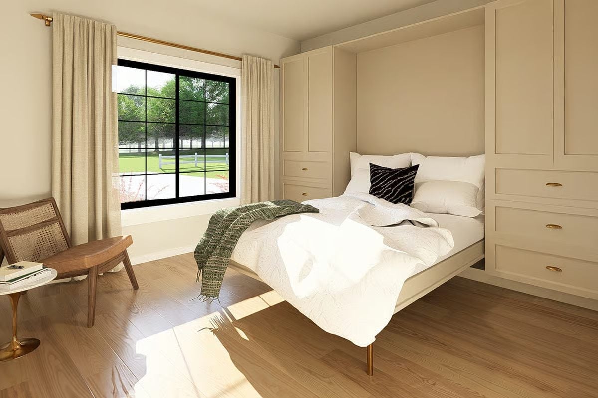 Beige Built-Ins and Brass Hardware Hiding a Murphy Bed in Full Sight