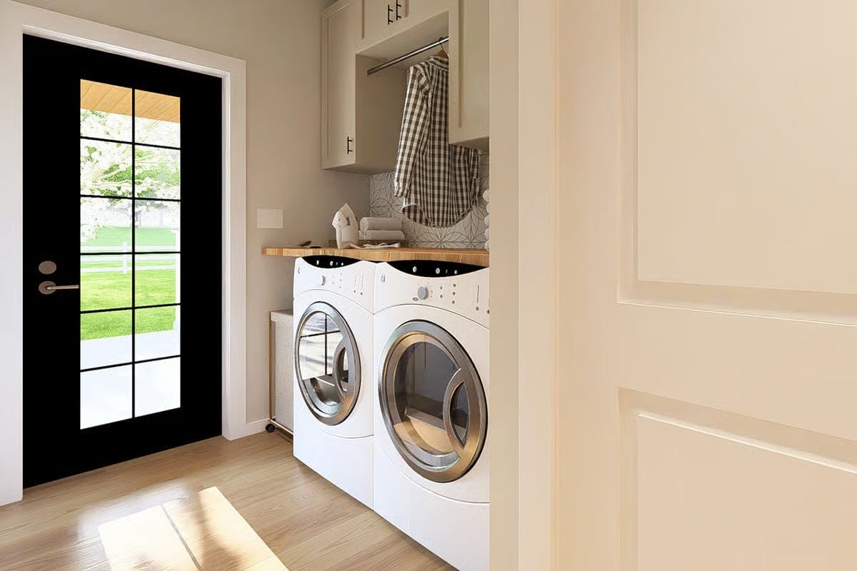 Hanging Rod Above the Washer Is Doing More Work Than It Looks