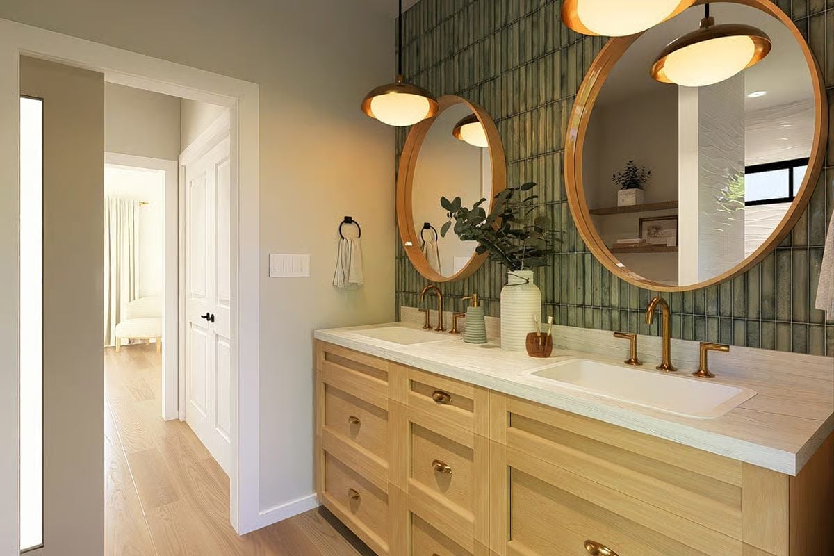Oval Mirrors and Brass Faucets That Make a Double Vanity Feel Intentional