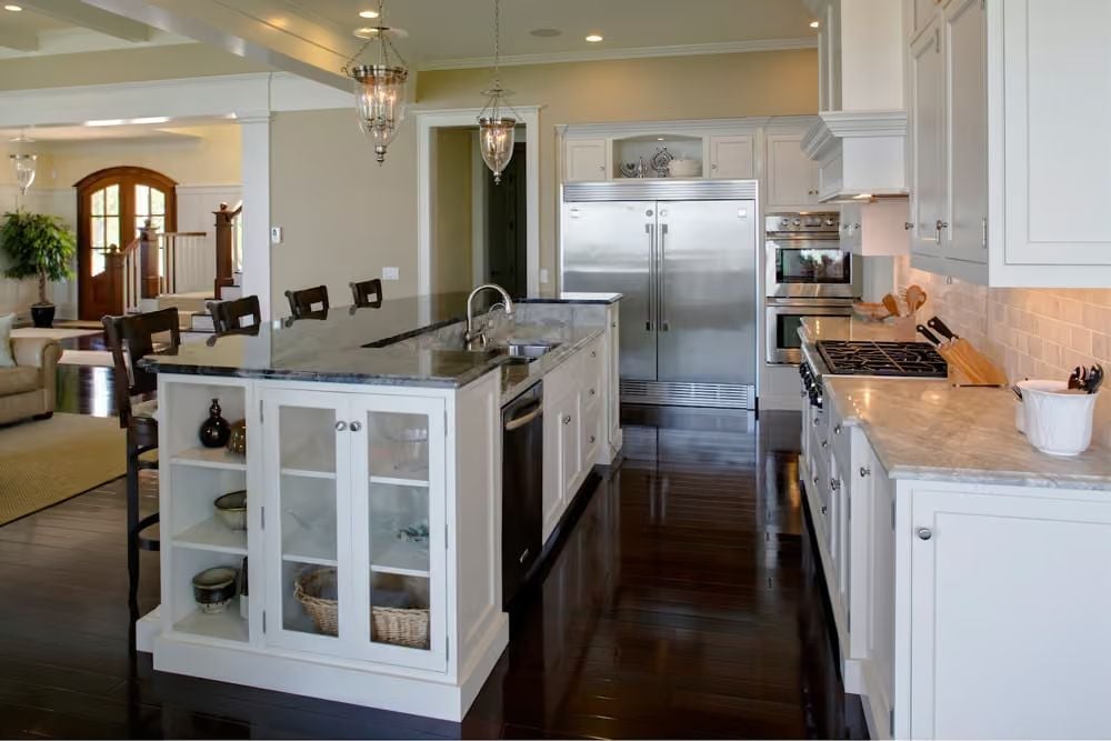 Glass-Front Cabinets on the Island End Give This Kitchen Its Best Storage Trick