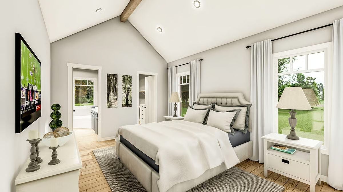 Vaulted Bedroom With Ceiling Beams That Pull the Eye Up Without Trying