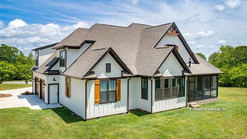 Board-and-Batten White, Wood Shutters, and a Screened Porch That Earns Its Square Footage