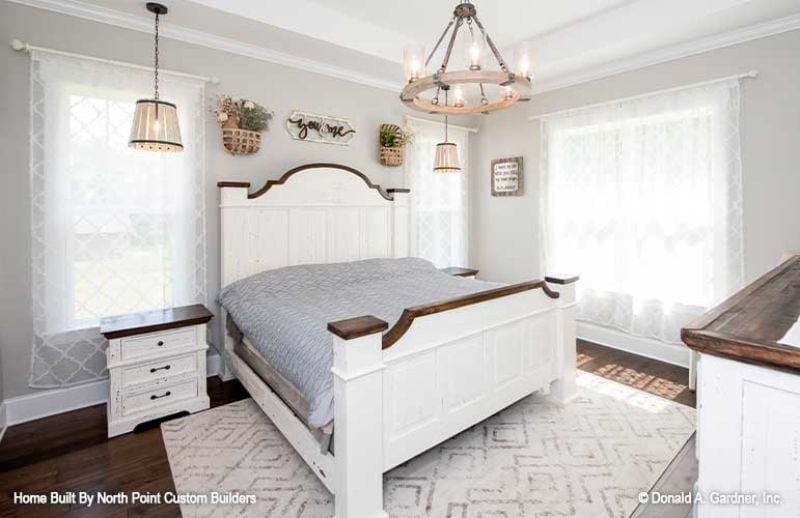 Distressed White Paint and Dark Wood Caps on a Bed Frame Worth Keeping Forever