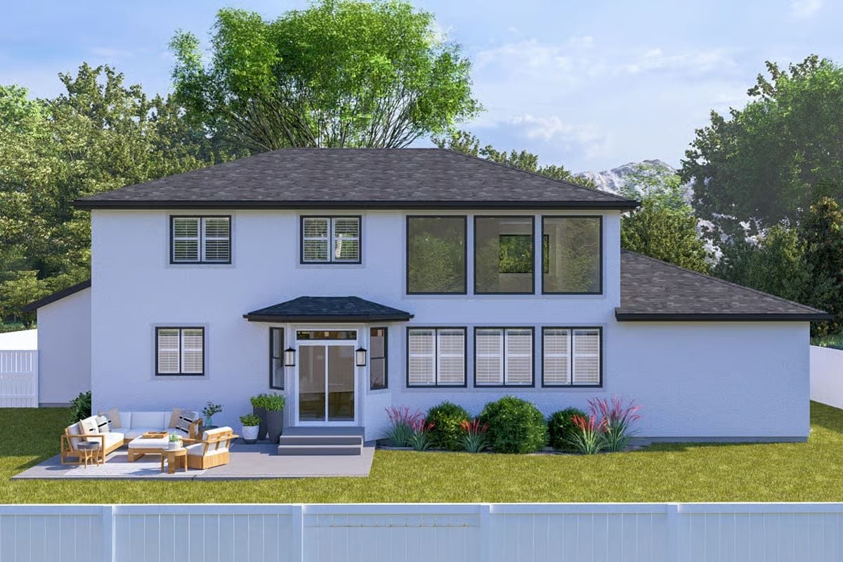 Dark-Trimmed Windows and a Hip Porch Roof Give the Rear Elevation Real Presence