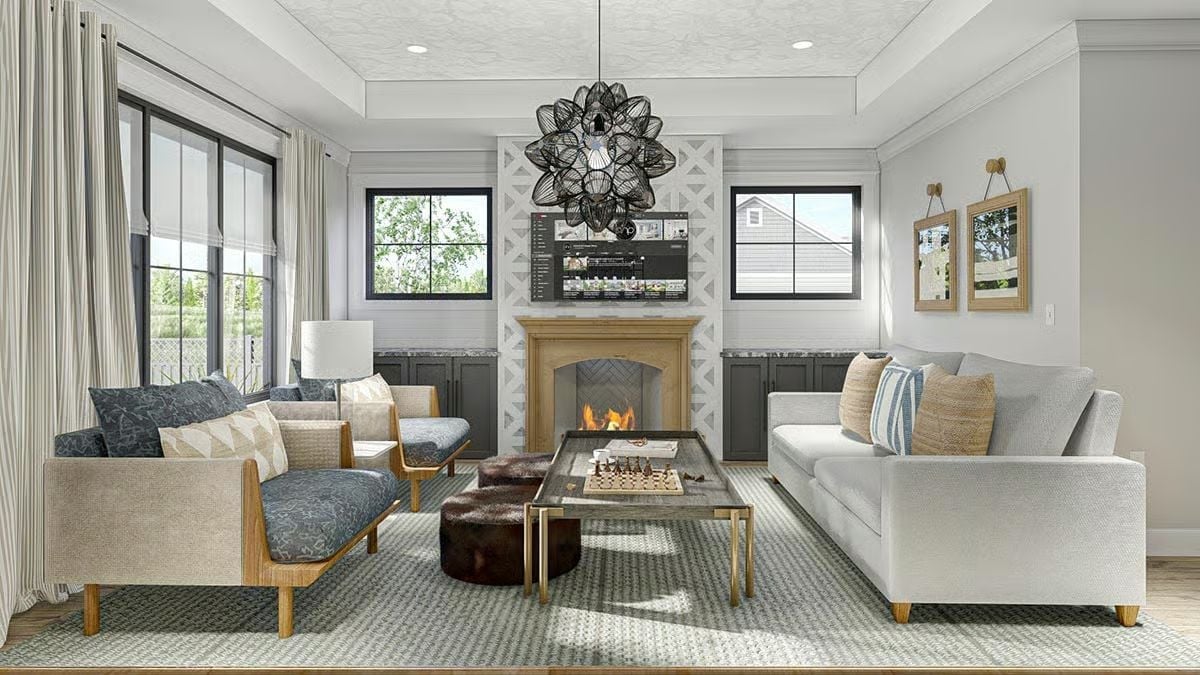 Brass-Framed Coffee Table and a Lit Fireplace Set the Tone for This Sitting Room