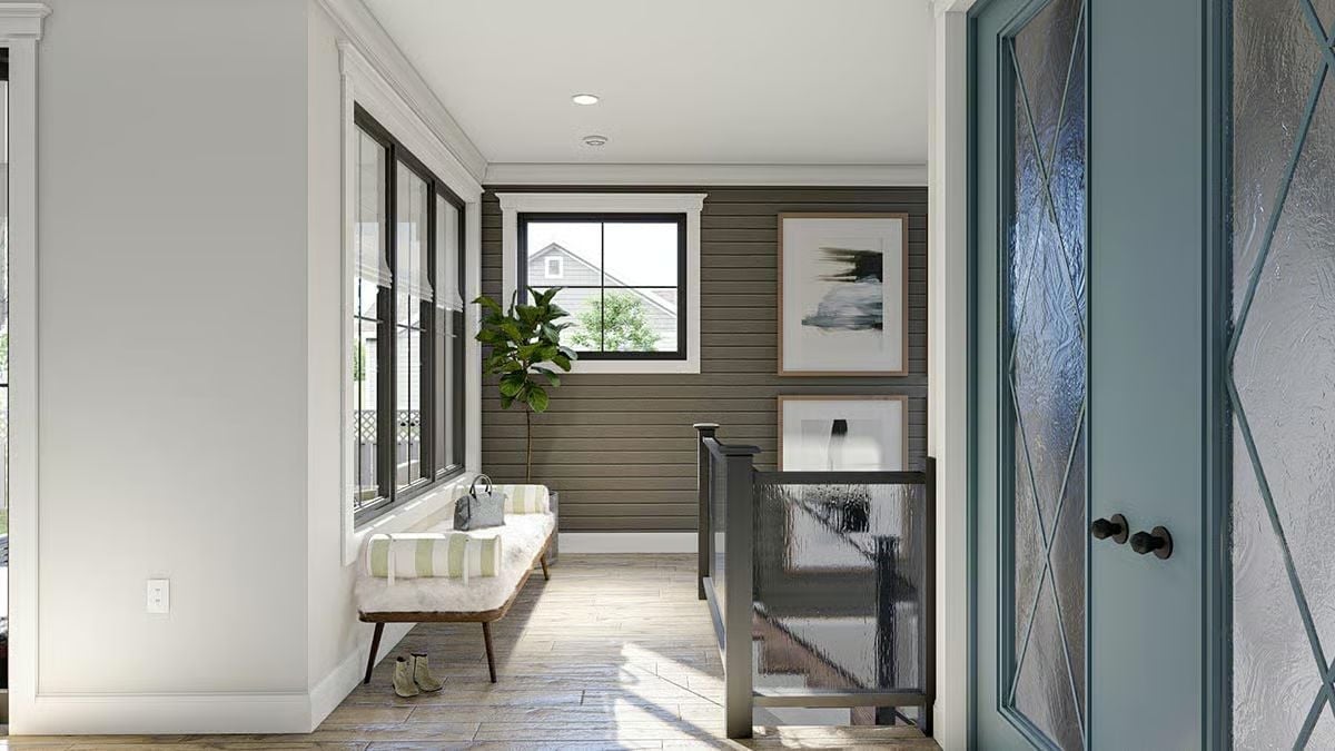 Shiplap Walls and Glass Railings Make the Upstairs Landing Feel Intentional