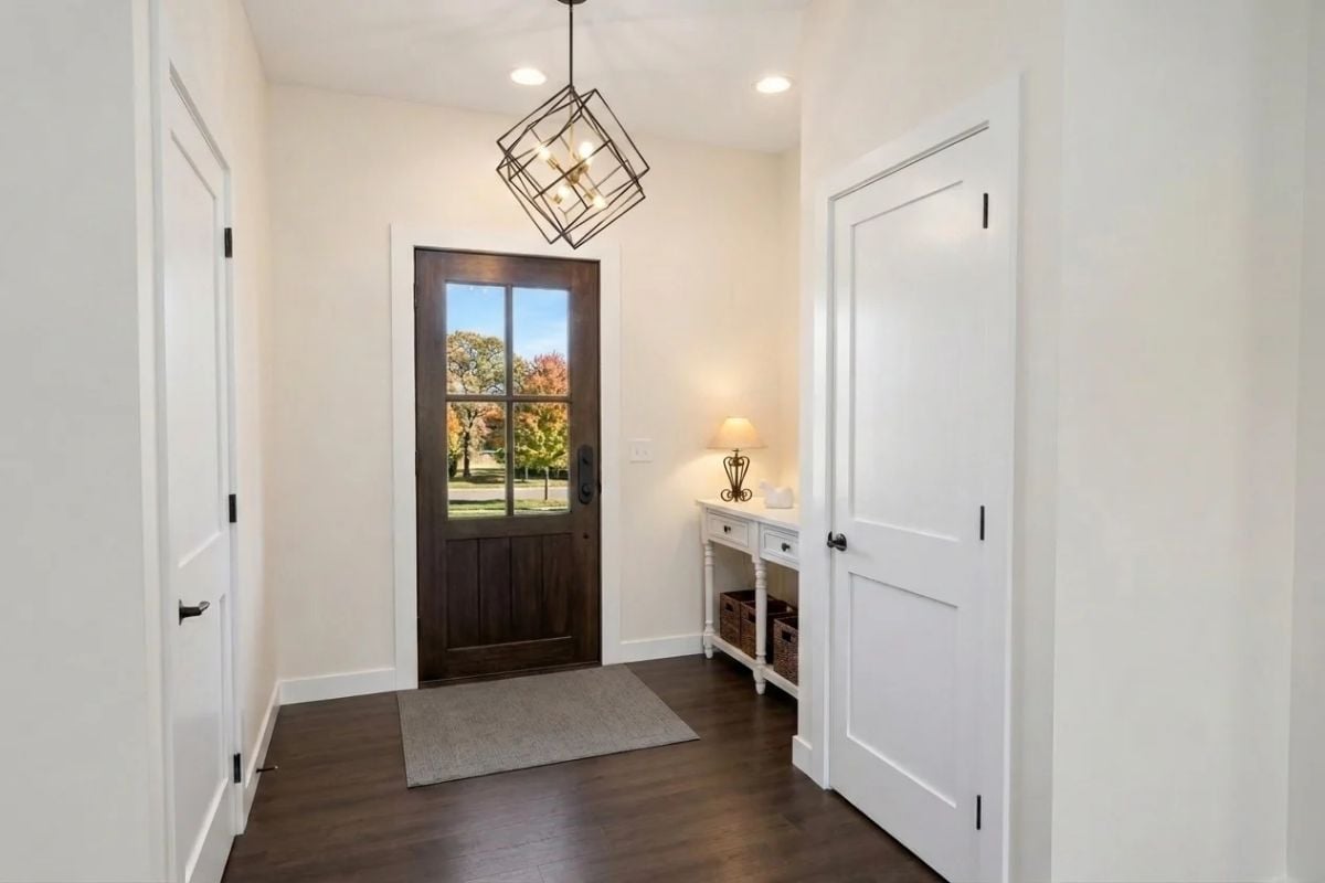 Dark Wood Entry Door with Glass Panels Sets the Tone Before You're Even Inside