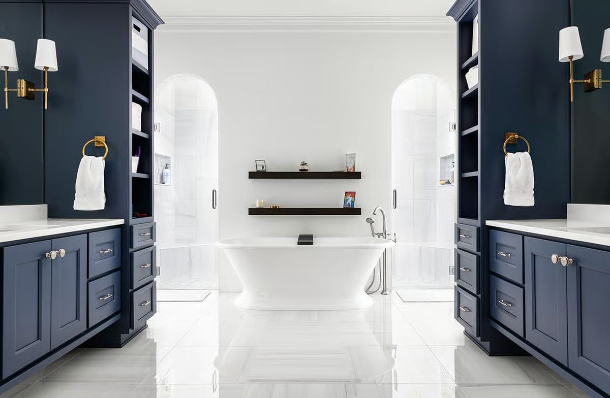 Navy Cabinetry and Arched Niches Built for Two People Who Don't Share a Sink