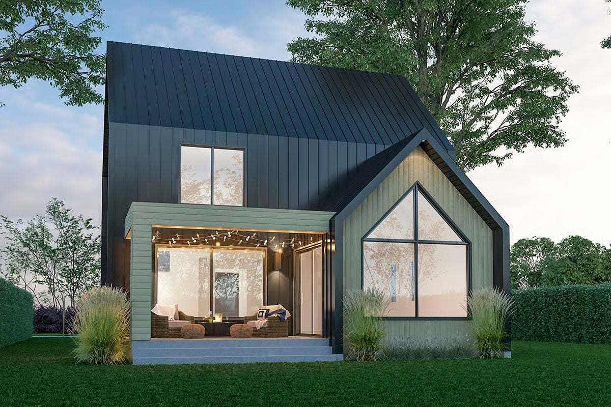 Dark Metal Cladding and String Lights That Make the Backyard Feel Like a Destination