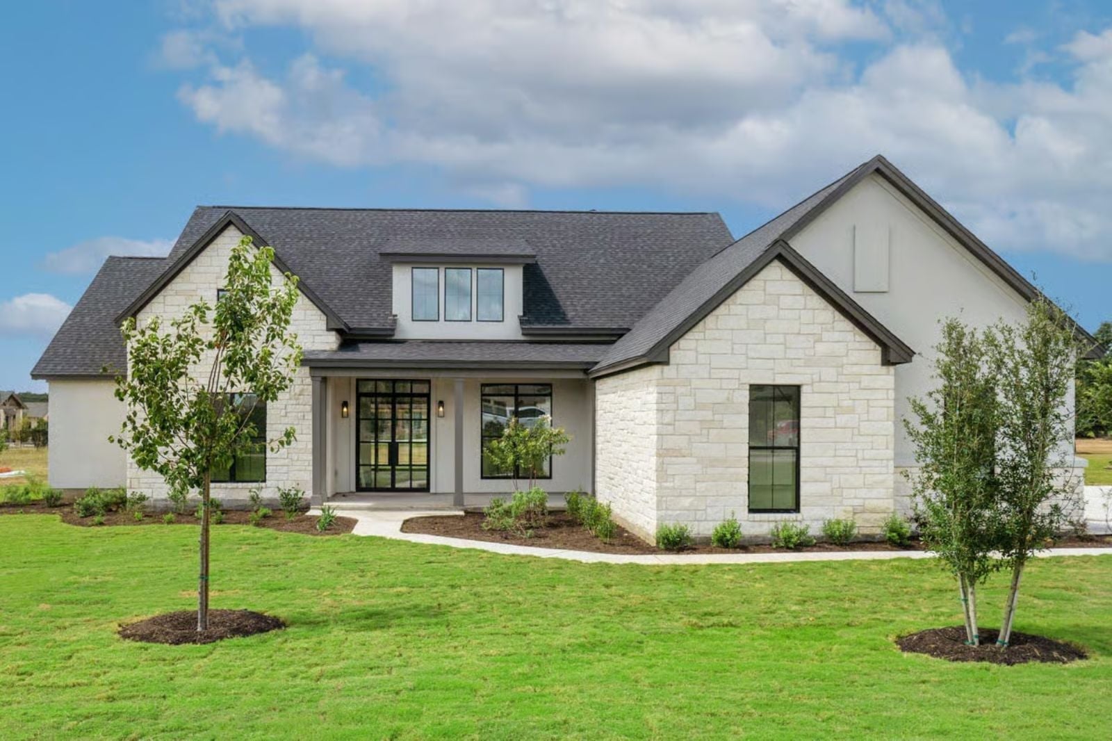 Austin Stone 4-Bedroom Transitional Farmhouse with Main-Floor Primary Designed for Families Who Actually Like Spending Time Together (Floor Plan)
