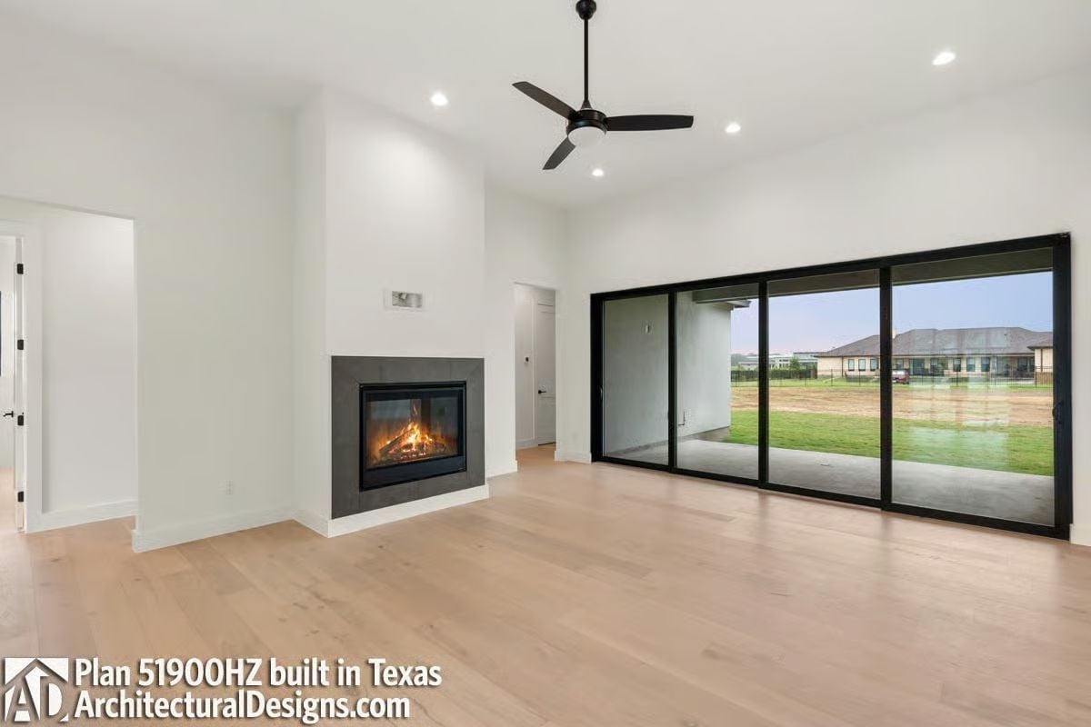 Hardwood, Fire, and Glass Make a Surprisingly Quiet Case for Open Living