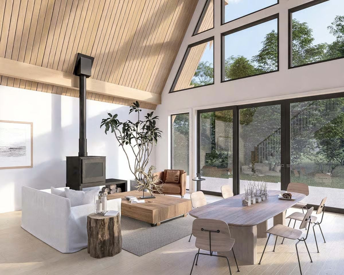 Vaulted Cedar, a Freestanding Stove, and Enough Glass to Forget You Have Walls
