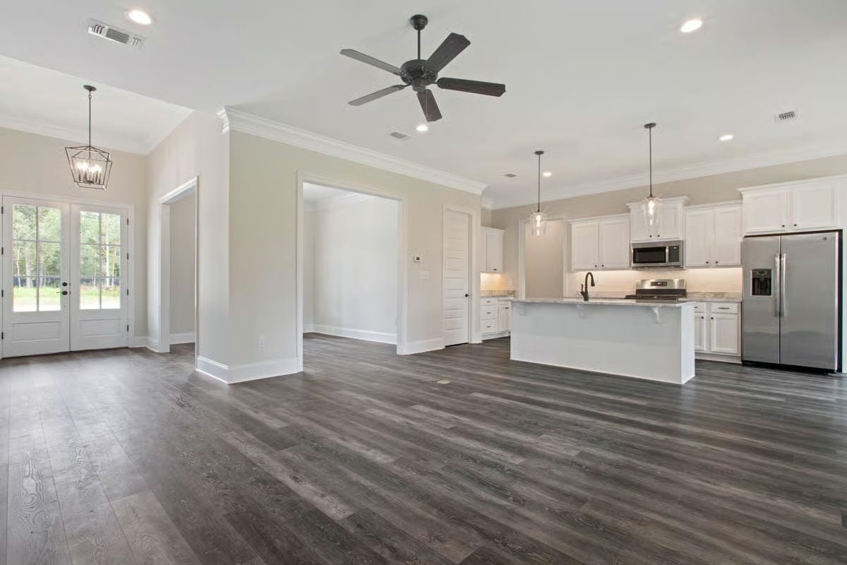 Dark Floors, Open Sightlines, and a Kitchen Island That Earns Its Square Footage