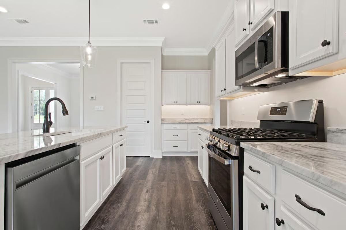 Marble Counters and Matte Black Hardware Doing Exactly What They Should