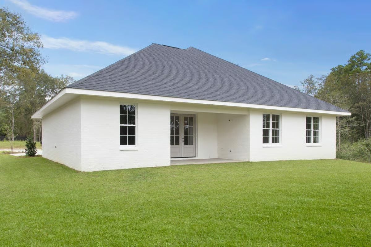 Painted Brick Exterior with Covered Rear Patio Built for Southern Summers