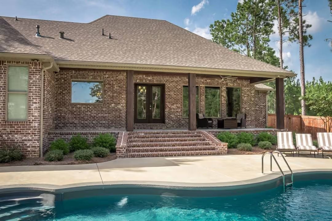 Brick, Pool, and a Covered Porch That Actually Gets Used