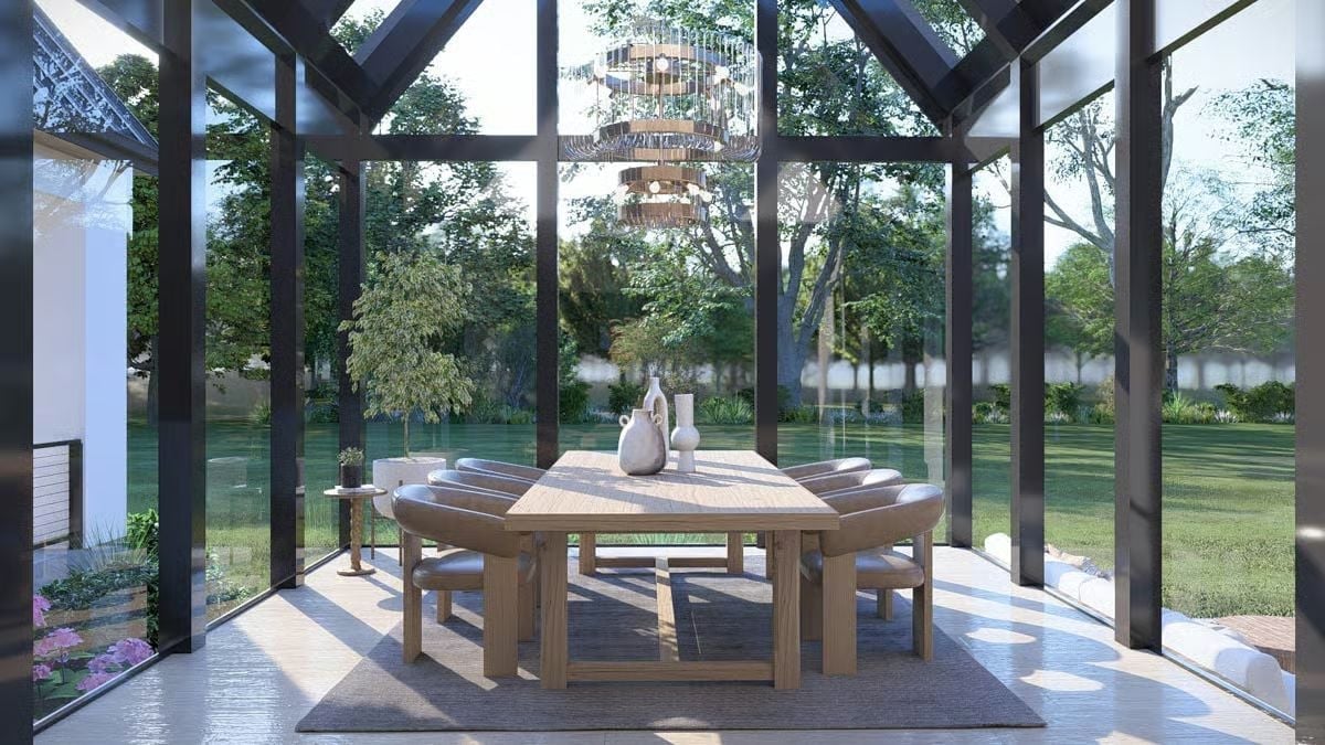 Glass Walls on All Sides and a Chandelier That Holds Its Own Against the Trees