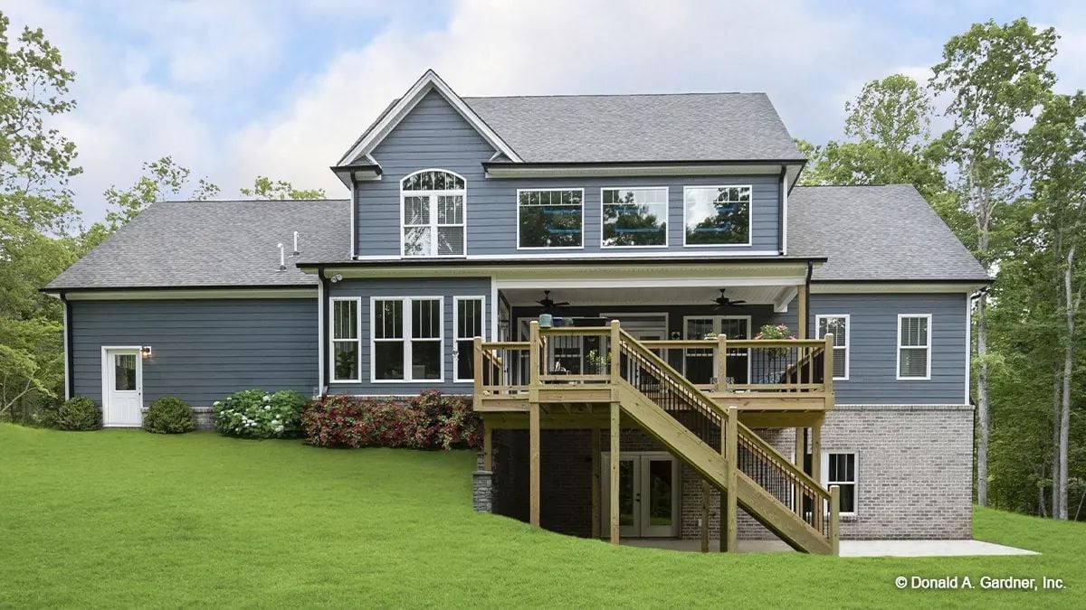 Blue Hardie Lap Siding and a Wood Deck Built for Backyard Living