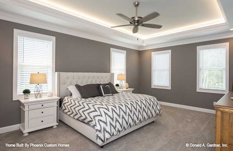 Tufted Headboard, Tray Ceiling, and Cove Lighting That Earns Its Keep