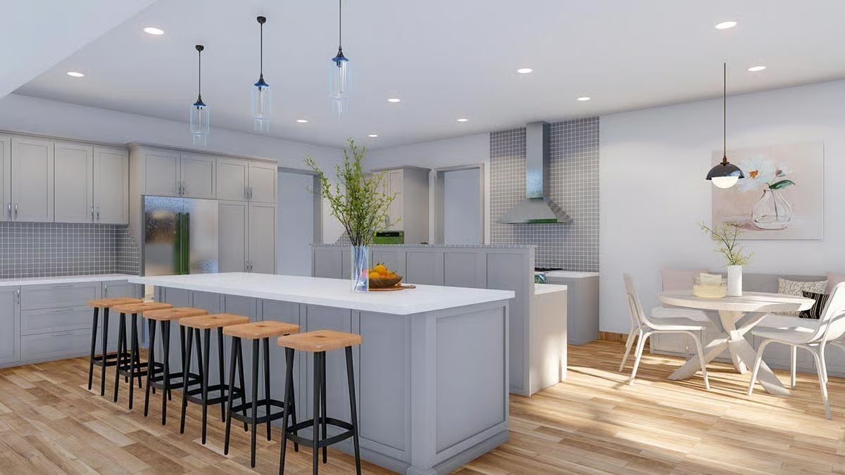 Gray Shaker Cabinets and a Long Island Pull the Whole Kitchen Together