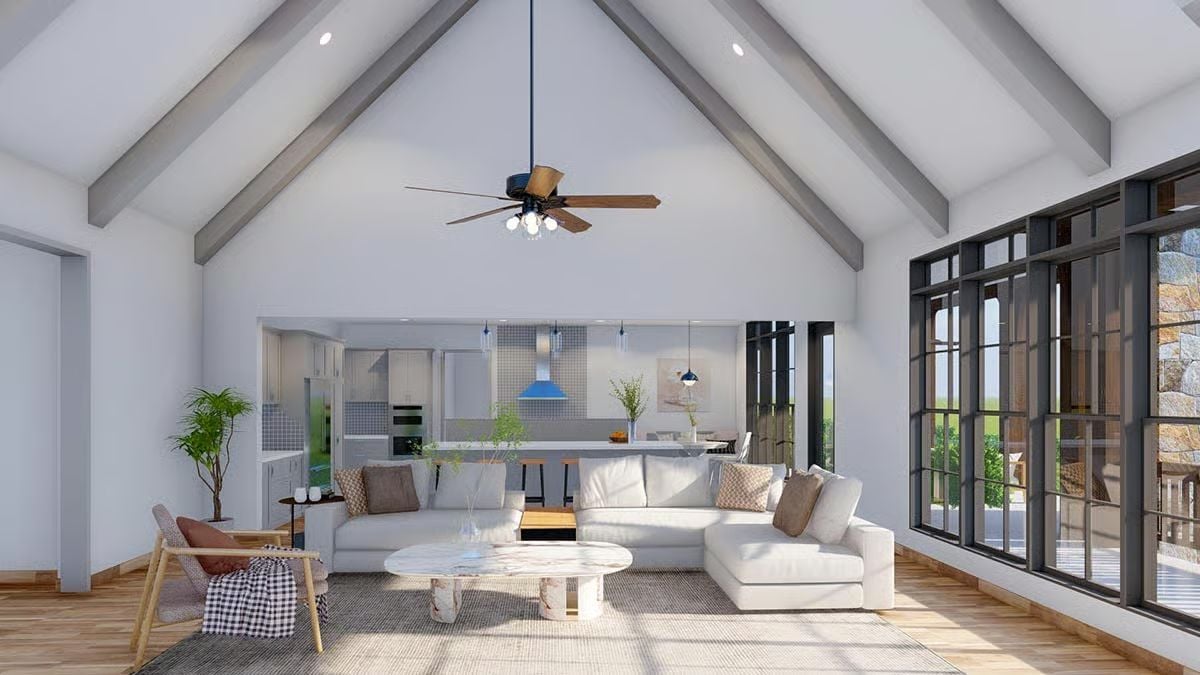 Vaulted Beams and an Open Kitchen Make the Living Room Feel Earned