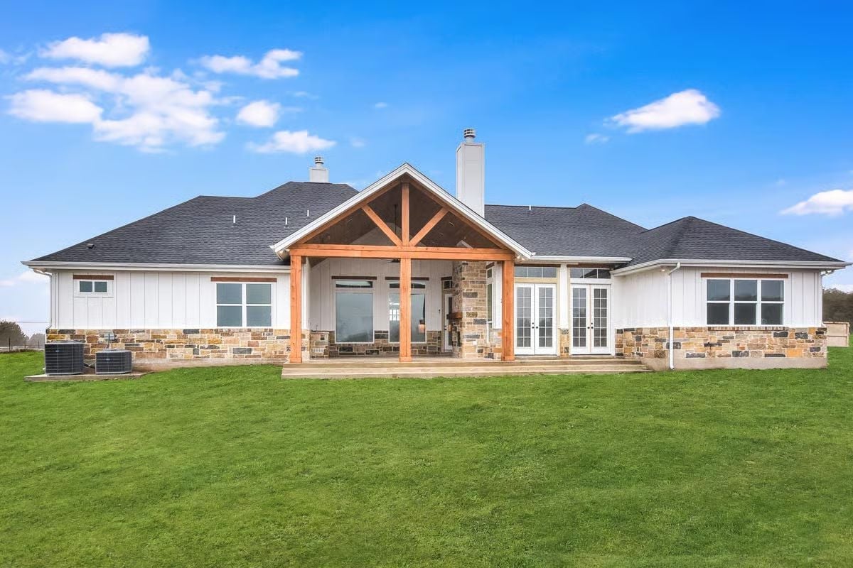 Cedar Timber Gable and Stone Base Make This Backyard Elevation Worth Studying