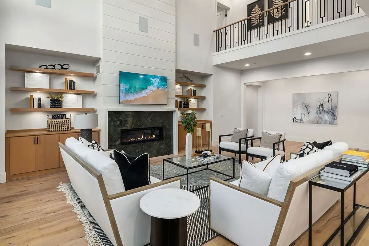Double-Height Ceilings That Give the Fireplace Room to Breathe