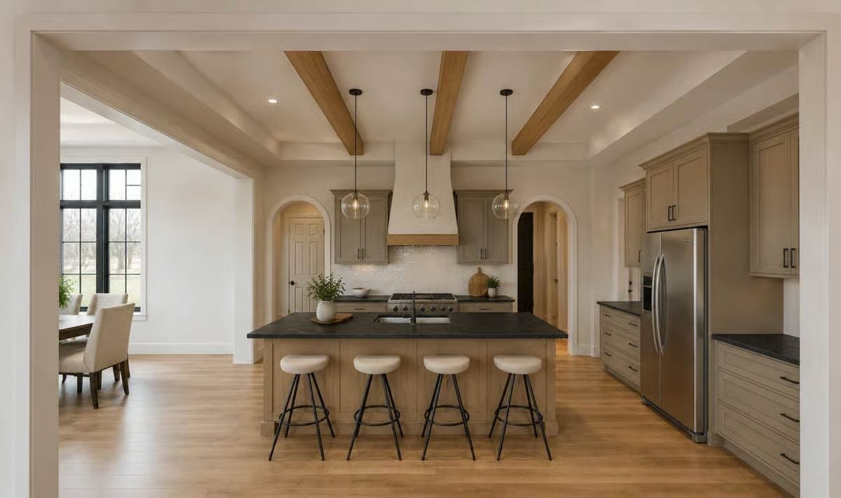 Exposed Beams, Globe Pendants, and a Dark Countertop That Grounds the Whole Room