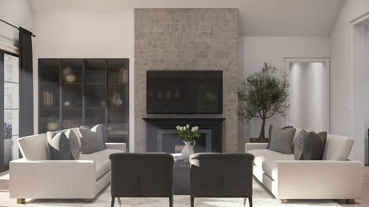 Stone Fireplace Surround Running Floor to Ceiling Changes What the Room Is About