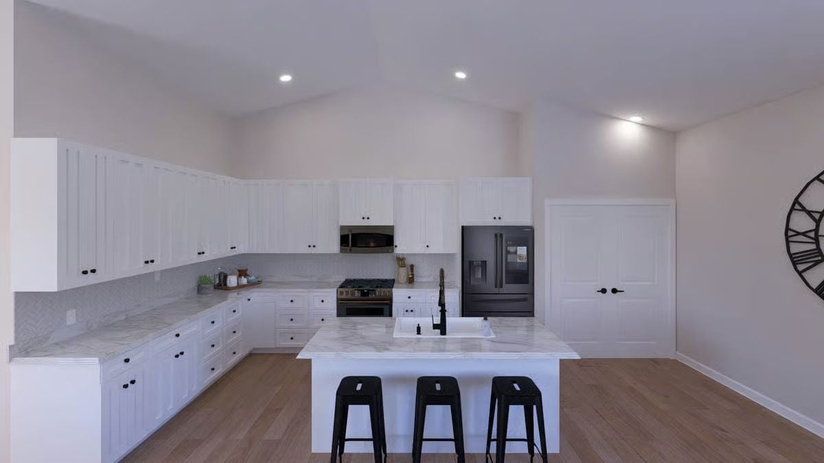 Black Hardware and Marble Counters on an Island Built for Feeding a Crowd