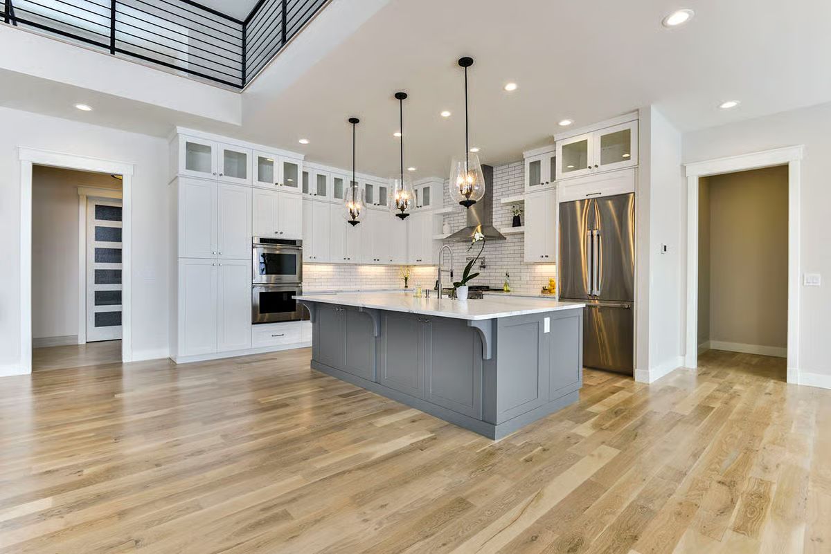Gray Island, White Cabinets, and Pendant Lights That Actually Earn Their Keep