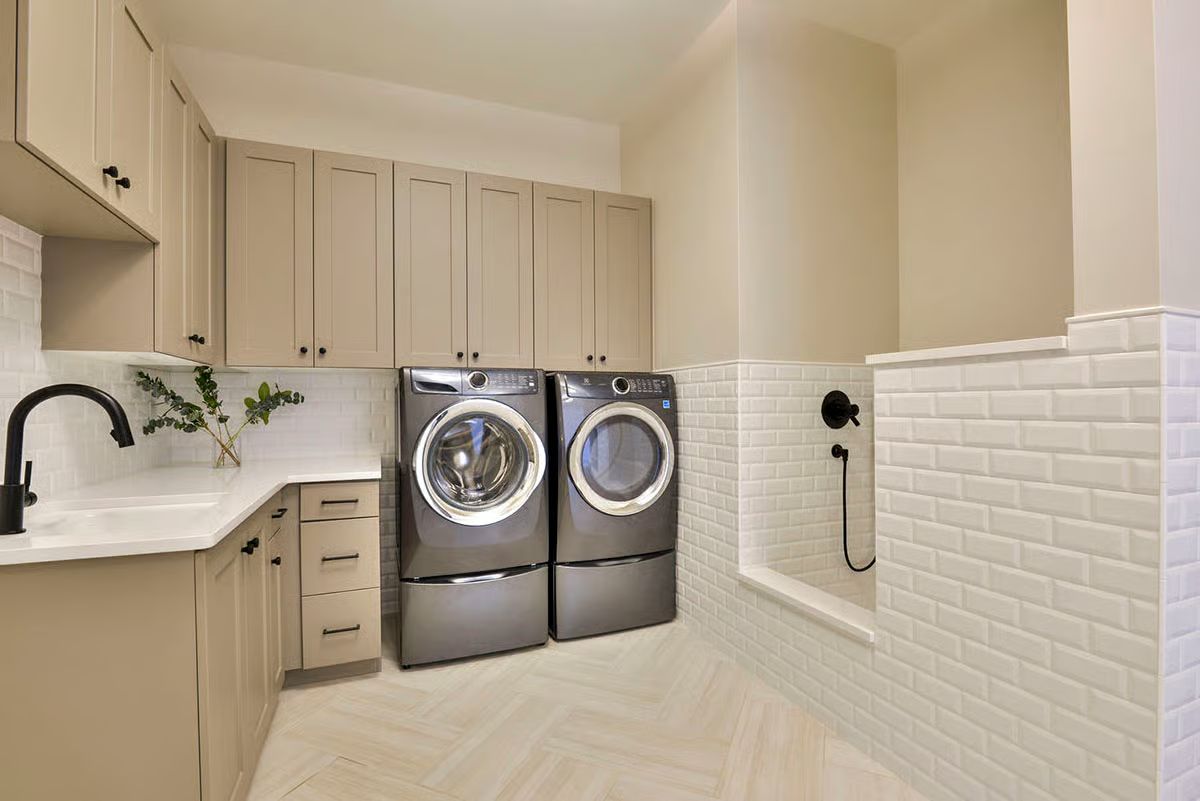 Subway Tile, Pedestal Washer-Dryer, and a Dog Shower That Earns Its Square Footage