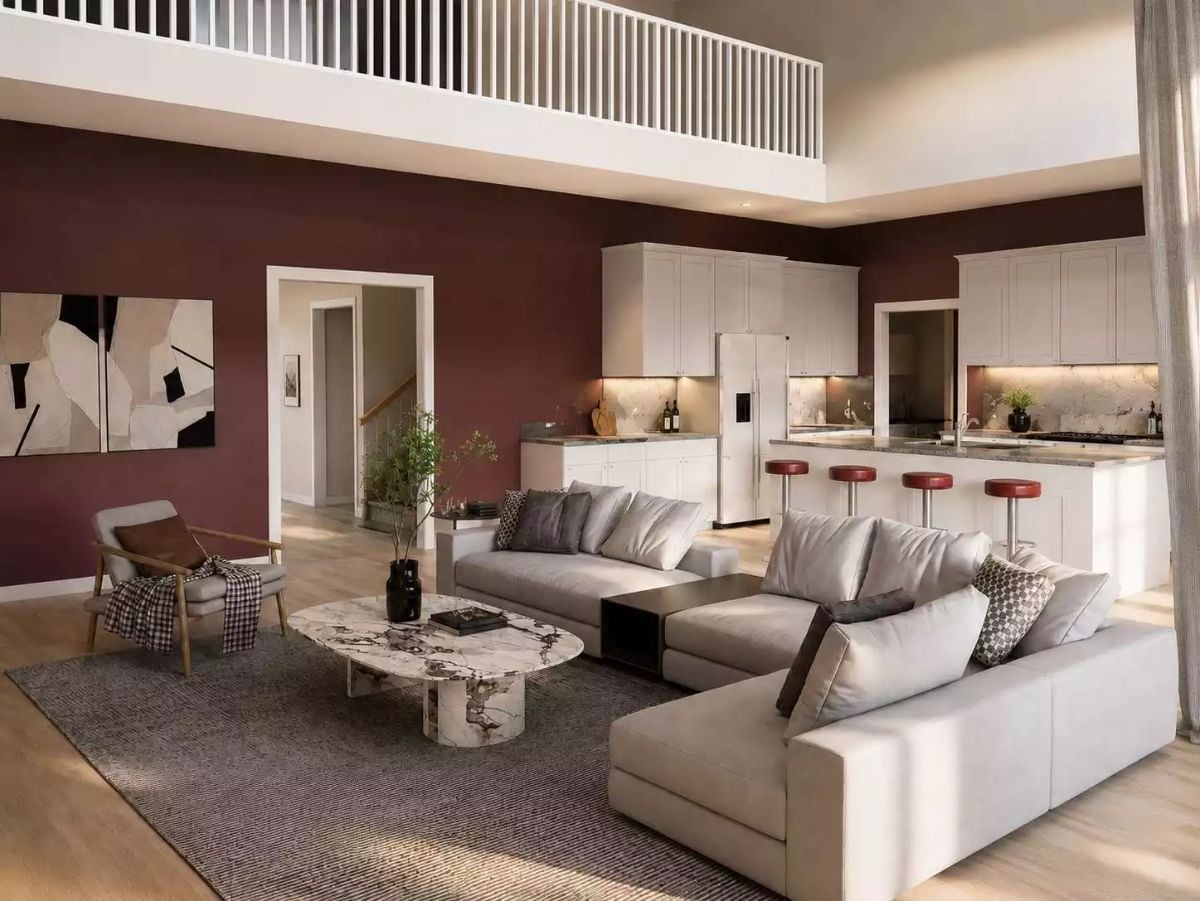 Burgundy Walls and a Sectional That Knows Its Place