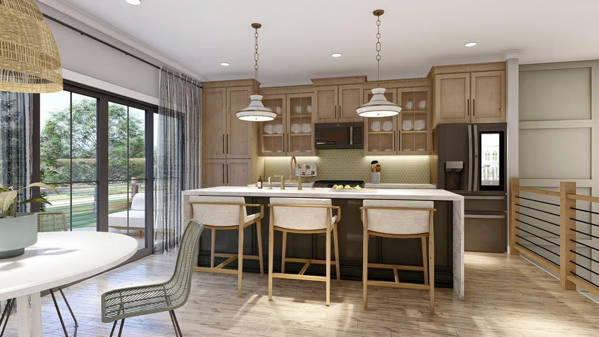 Gold Hardware, Dark Island, and a Backsplash That Knows Exactly What It's Doing