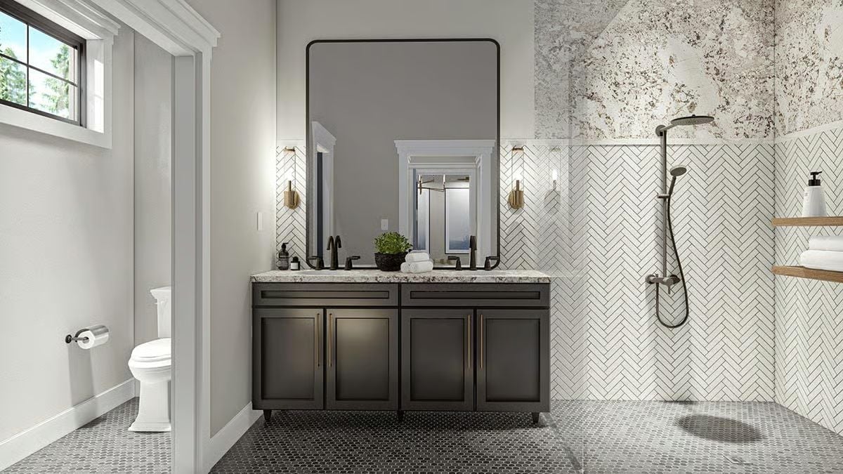 Herringbone Tile and a Double Vanity That Don't Apologize for Taking Up Space