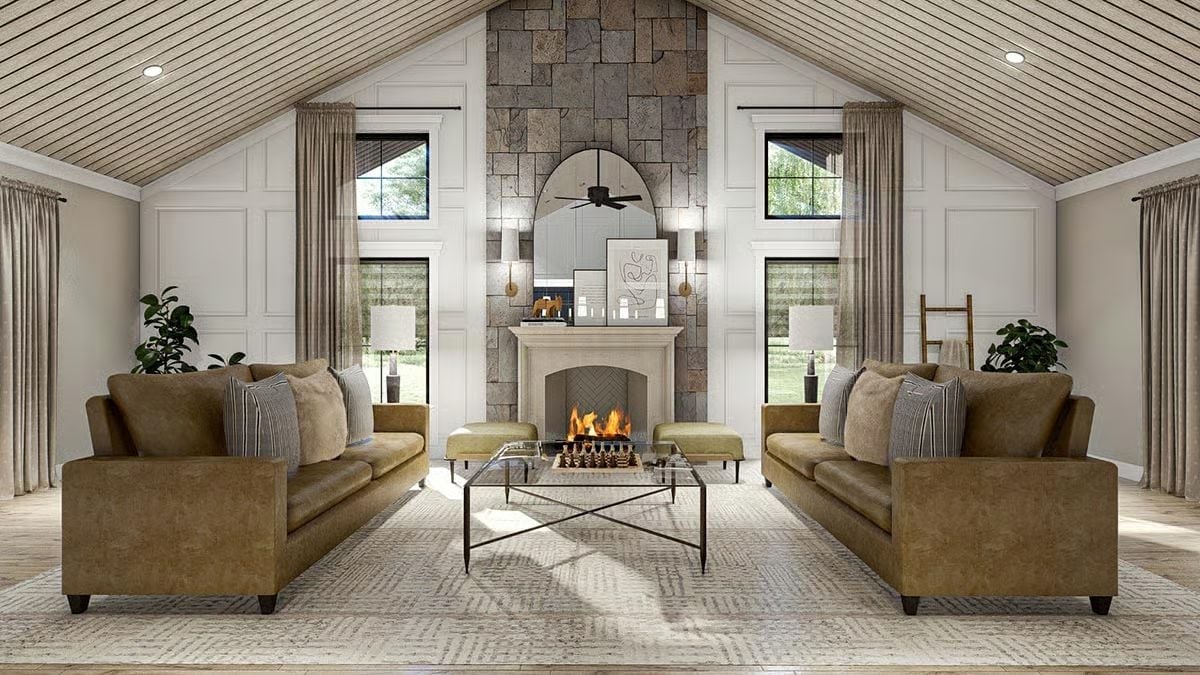 Matched Leather Sofas and a Live Fire Make This the Hardest Room to Leave