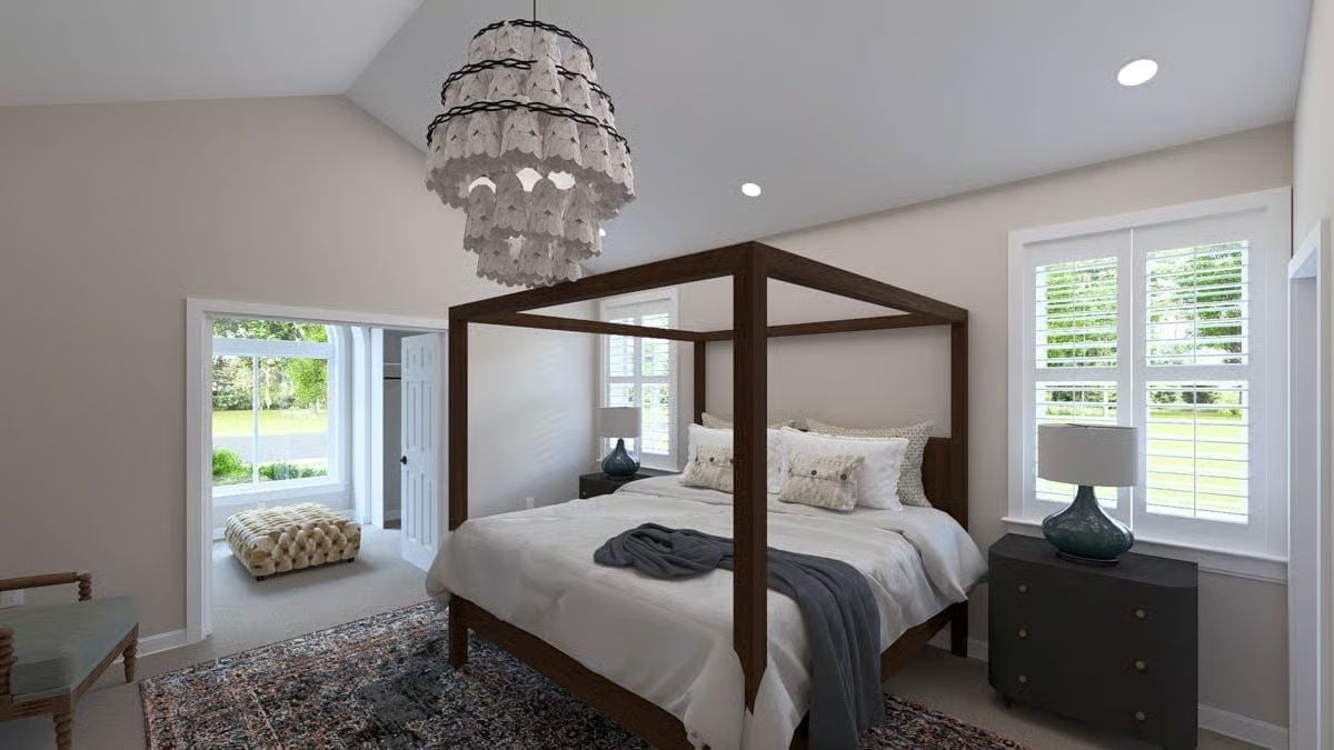 Four-Poster Canopy Frame and Shell Chandelier Split the Room's Personality Right Down the Middle